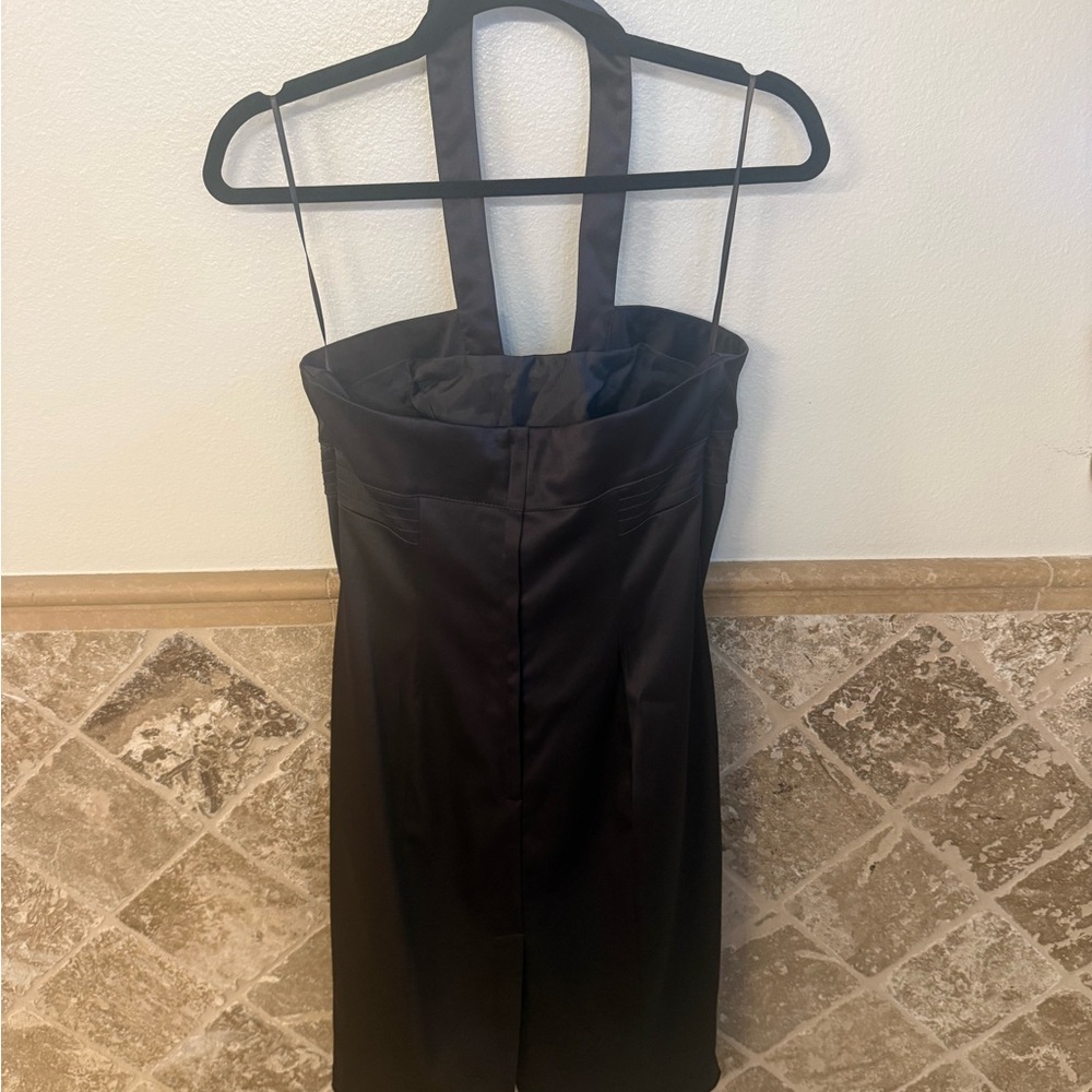 This halter satin dress is Sleek, stunning, and effortlessly elegant.
